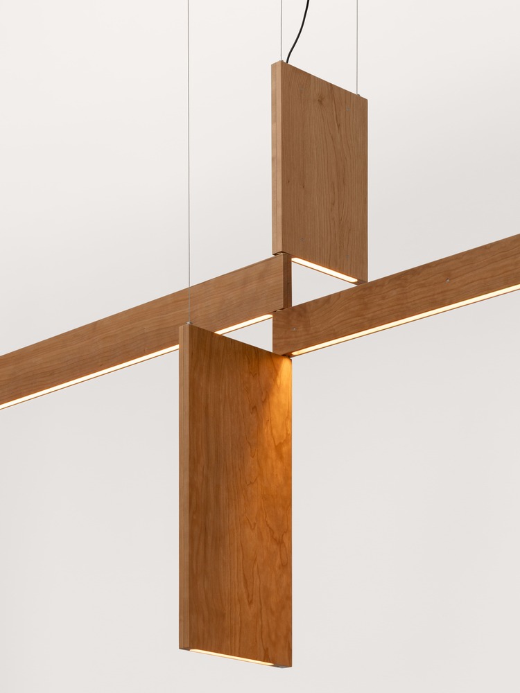 Courtesy of Friedman Benda and formafantasma Photography byMarco Cappelletti  Formafantasma Andrea Trimarchi [Italian, b. 1983] and Simone Farresin [Italian, b. 1980] Chandelier, 2024 Cherry wood, LED andacrylic 42 1/2 x 94 x 8 3/4 inches108 x 239 x 22cm Edition of 8