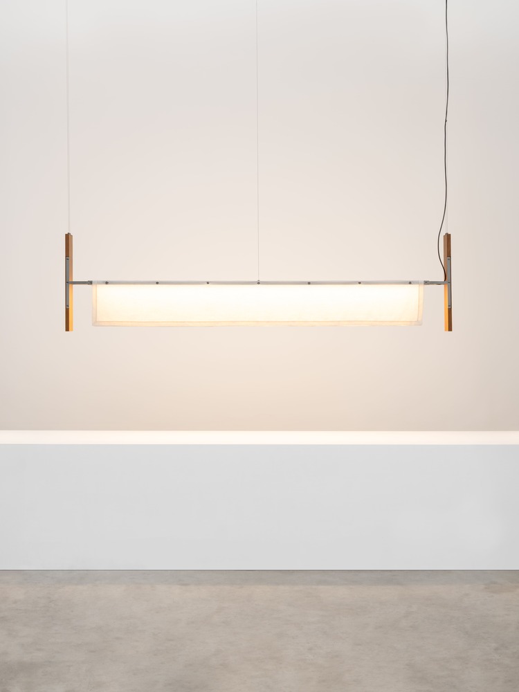 Courtesy of Friedman Benda and formafantasma Photography by Marco Cappelletti  Formafantasma Andrea Trimarchi [Italian, b. 1983] and Simone Farresin [Italian, b. 1980] End to End, 2024 Cherry, Aluminum, LED and PPMA 23 1/2 x 93 3/4 x 7 inches 60 x 238 x 18 cm Edition of 8